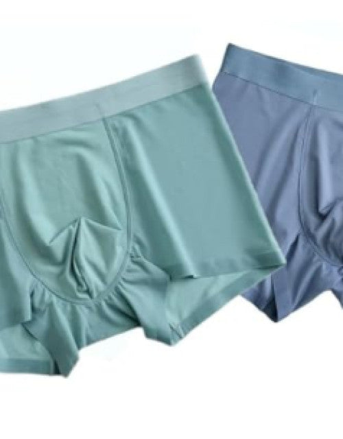 These Men's Ultr Soft Lycra Material Ice-Silk Men's Shorts Underwear Men's Brief Boxer come in a pack of 2, offering both comfort and style. Made with ultralight and breathable ice-silk material, they provide a soft and smooth feel against the skin. Perfect for everyday wear, these boxer briefs offer a comfortable fit and a variety of colors to choose from. Upgrade your underwear collection with these high-quality briefs.
