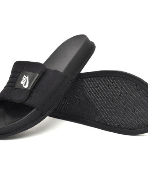 Experience superior comfort and support with the Nike Offcourt Adjust Slide Sandal. Designed for easy adjustability, these slides feature a secure strap that ensures a personalized fit. The cushioned footbed provides lasting comfort, making them ideal for post-workout recovery or casual wear. Durable materials and a textured outsole offer reliable traction and longevity, perfect for both indoor and outdoor use. Elevate your everyday footwear with this expertly crafted sandal that combines functionality