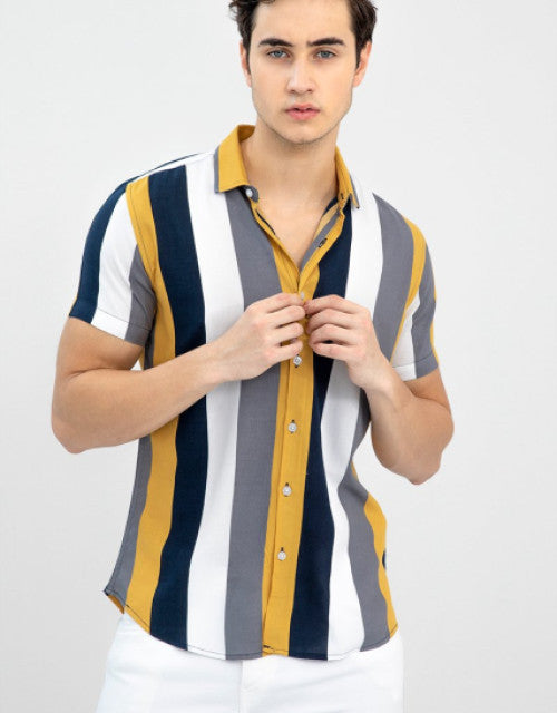 Slim Fit Color Block Cut Away Collar Casual Shirt

Expertly tailored for the modern wardrobe, this Slim Fit Color Block Cut Away Collar Casual Shirt combines contemporary design with exceptional comfort. The distinctive color block pattern creates visual interest while the cut away collar adds a sophisticated touch. The slim fit silhouette enhances your physique without restricting movement, making it ideal for both casual outings and semi-formal occasions.