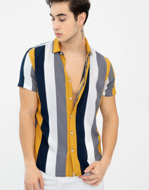 Slim Fit Color Block Cut Away Collar Casual Shirt

Expertly tailored for the modern wardrobe, this Slim Fit Color Block Cut Away Collar Casual Shirt combines contemporary design with exceptional comfort. The distinctive color block pattern creates visual interest while the cut away collar adds a sophisticated touch. The slim fit silhouette enhances your physique without restricting movement, making it ideal for both casual outings and semi-formal occasions.