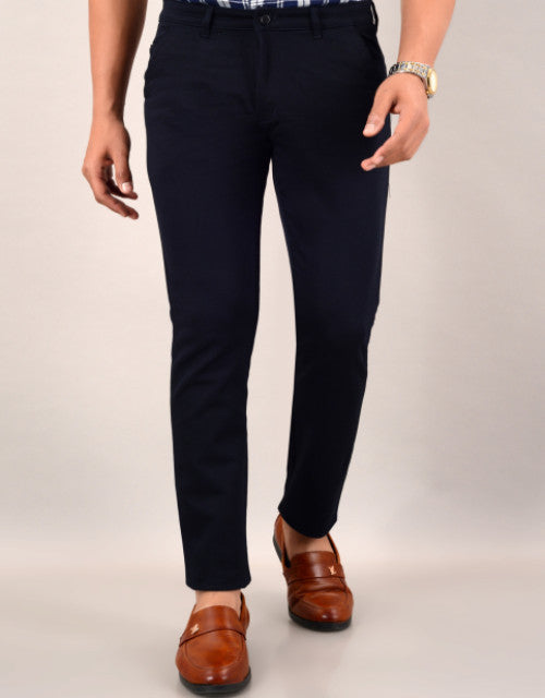 Introducing our Men's Slim Fit Casual Trouser in navy blue. Available in sizes 30, 32, 34, and 36, these trousers offer a sleek and modern fit for any occasion. Expertly crafted for a polished look, these trousers are the perfect addition to any wardrobe.