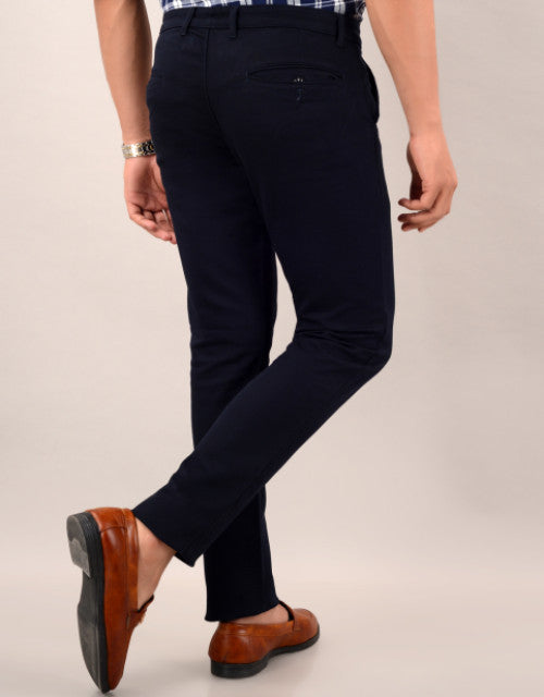 Introducing our Men's Slim Fit Casual Trouser in navy blue. Available in sizes 30, 32, 34, and 36, these trousers offer a sleek and modern fit for any occasion. Expertly crafted for a polished look, these trousers are the perfect addition to any wardrobe.