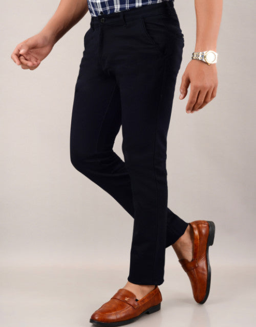 Introducing our Men's Slim Fit Casual Trouser in navy blue. Available in sizes 30, 32, 34, and 36, these trousers offer a sleek and modern fit for any occasion. Expertly crafted for a polished look, these trousers are the perfect addition to any wardrobe.