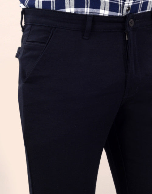 Introducing our Men's Slim Fit Casual Trouser in navy blue. Available in sizes 30, 32, 34, and 36, these trousers offer a sleek and modern fit for any occasion. Expertly crafted for a polished look, these trousers are the perfect addition to any wardrobe.