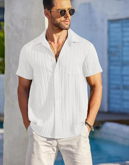 Crafted with textured popcorn fabric, this white half-sleeve shirt offers sophisticated breathability for the modern man. The versatile design transitions seamlessly from casual to semi-formal settings, while the available sizes (M, L, XL) ensure a tailored fit. Ideal for warm weather with its lightweight construction and distinctive texture that elevates your everyday wardrobe.