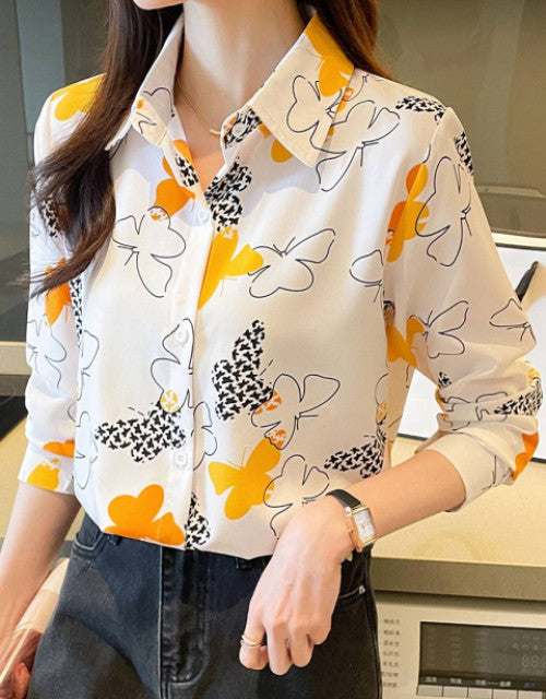 Expertly crafted women's casual shirt featuring a regular fit silhouette with tasteful printed patterns. The versatile design transitions effortlessly from day to evening wear, while quality fabric ensures comfort during extended wear. Perfect for pairing with jeans, trousers, or skirts for a polished yet relaxed appearance.