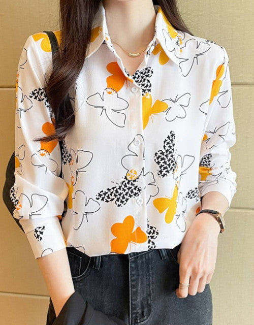 Expertly crafted women's casual shirt featuring a regular fit silhouette with tasteful printed patterns. The versatile design transitions effortlessly from day to evening wear, while quality fabric ensures comfort during extended wear. Perfect for pairing with jeans, trousers, or skirts for a polished yet relaxed appearance.